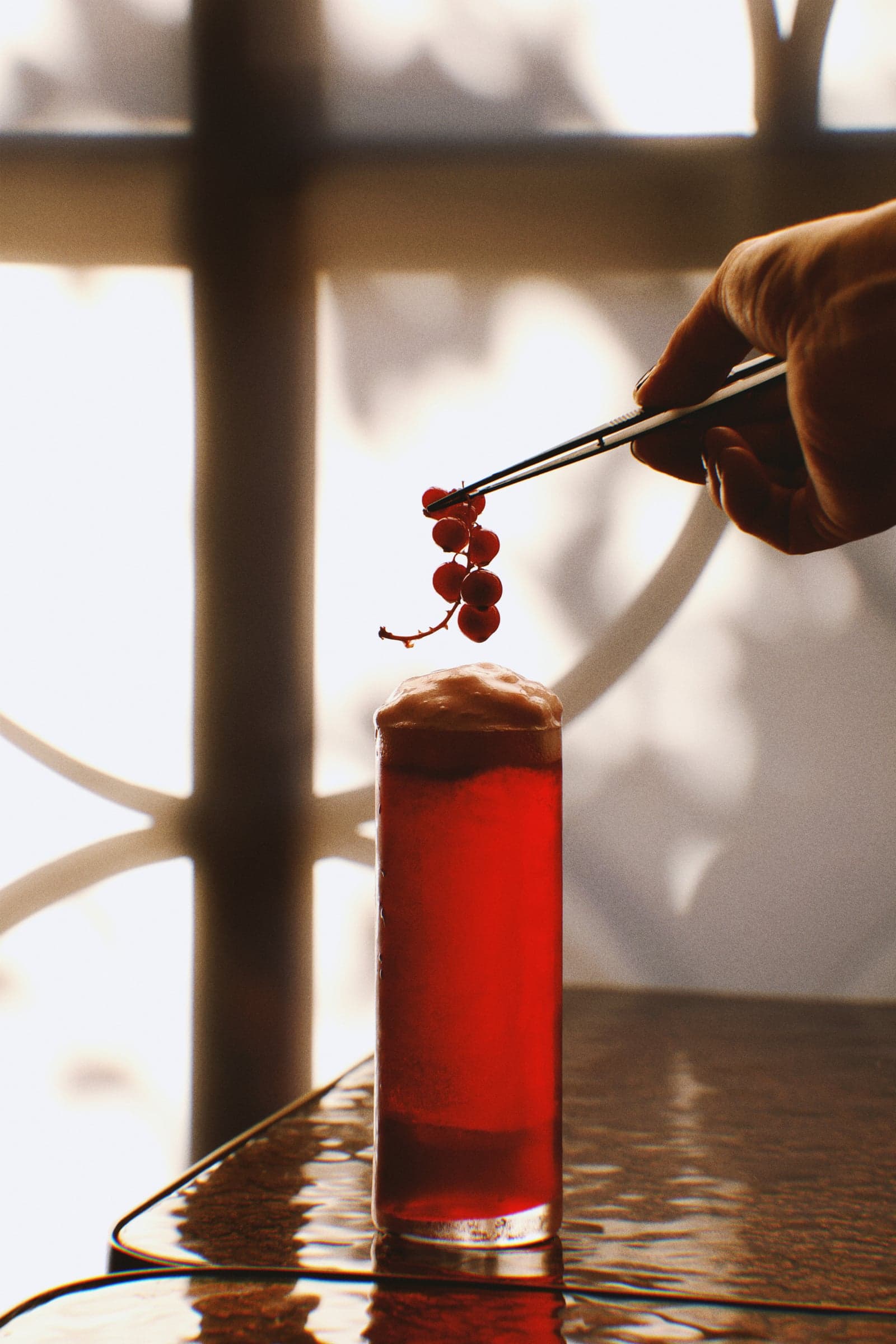 Red currants set with tweezers